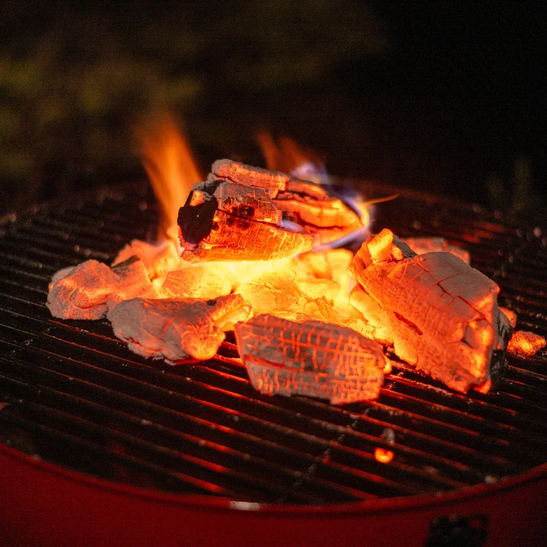 Glowing hardwood charcoal — get in touch with Afri United Charcoal Trading